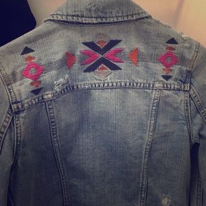 Distressed denim jacket